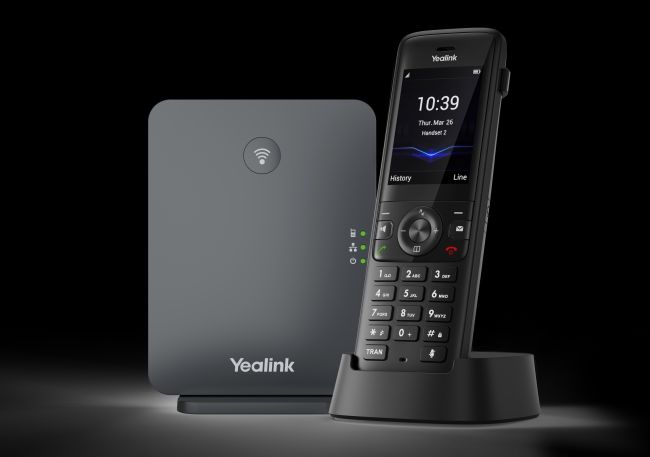 Yealink W78P DECT IP phone system - W70B base station and W78H cordless VoIP handset on charger