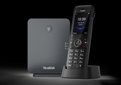 Yealink W78P DECT IP phone system - W70B base station and W78H cordless VoIP handset on charger